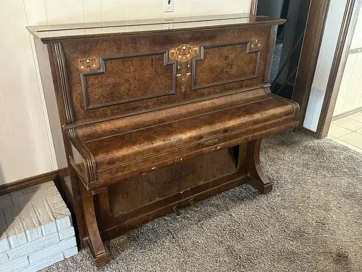 Decorative wood upright piano with floral inlay
